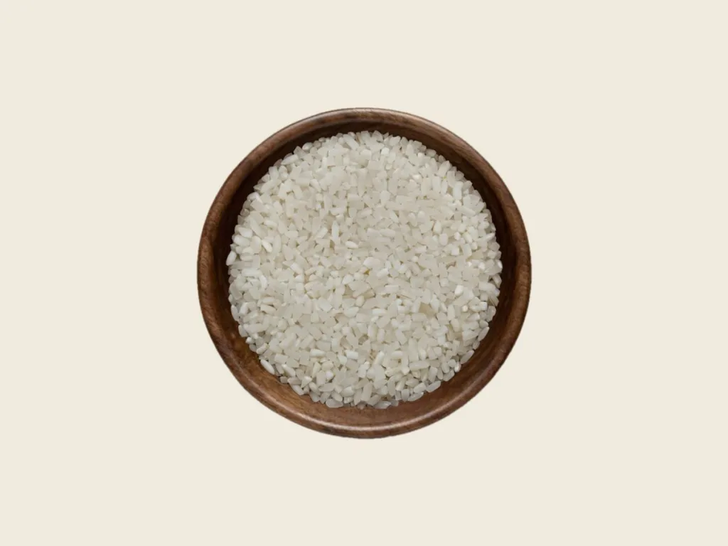 100% broken Rice in a wooden bowl