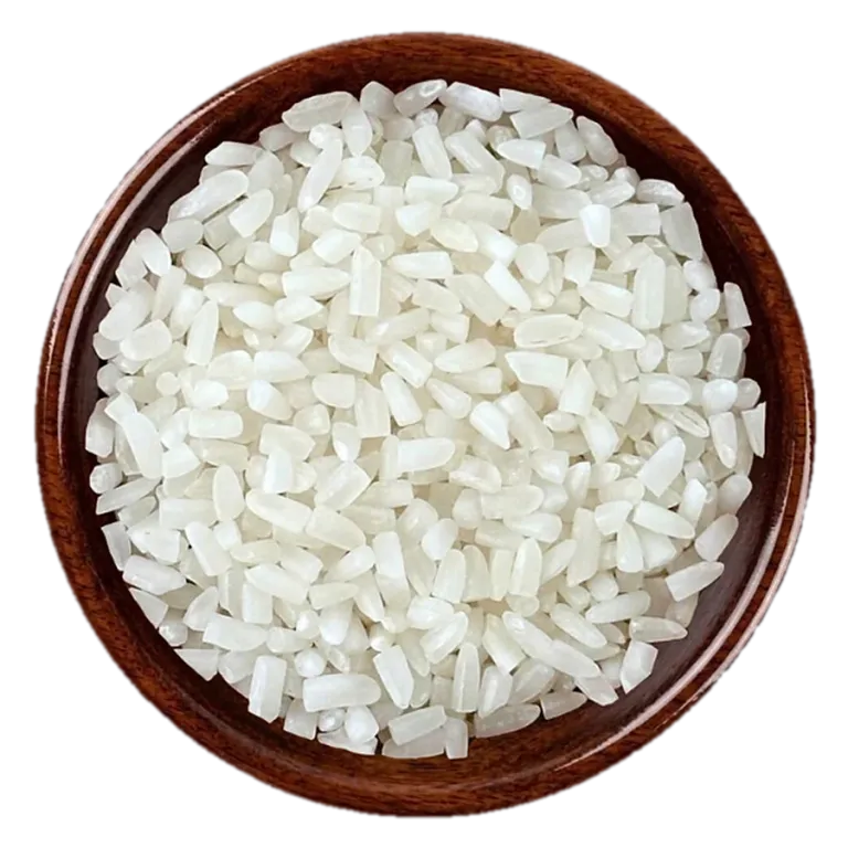 100% broken Rice in a wooden bowl, seen from above