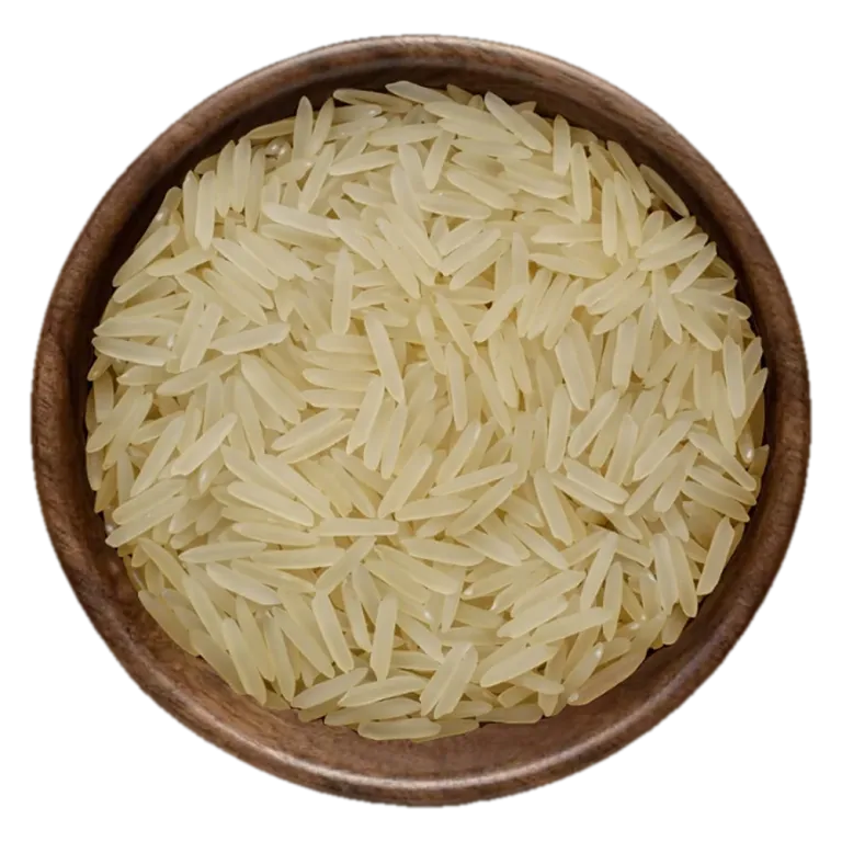Close view of 1121 Basmati Creamy Sella Rice grains in a wooden bowl, seen from above