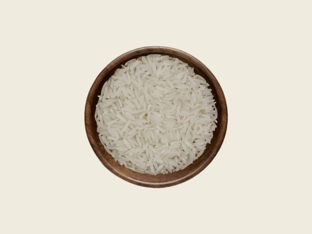 C-9 long grain white Rice in a wooden bowl