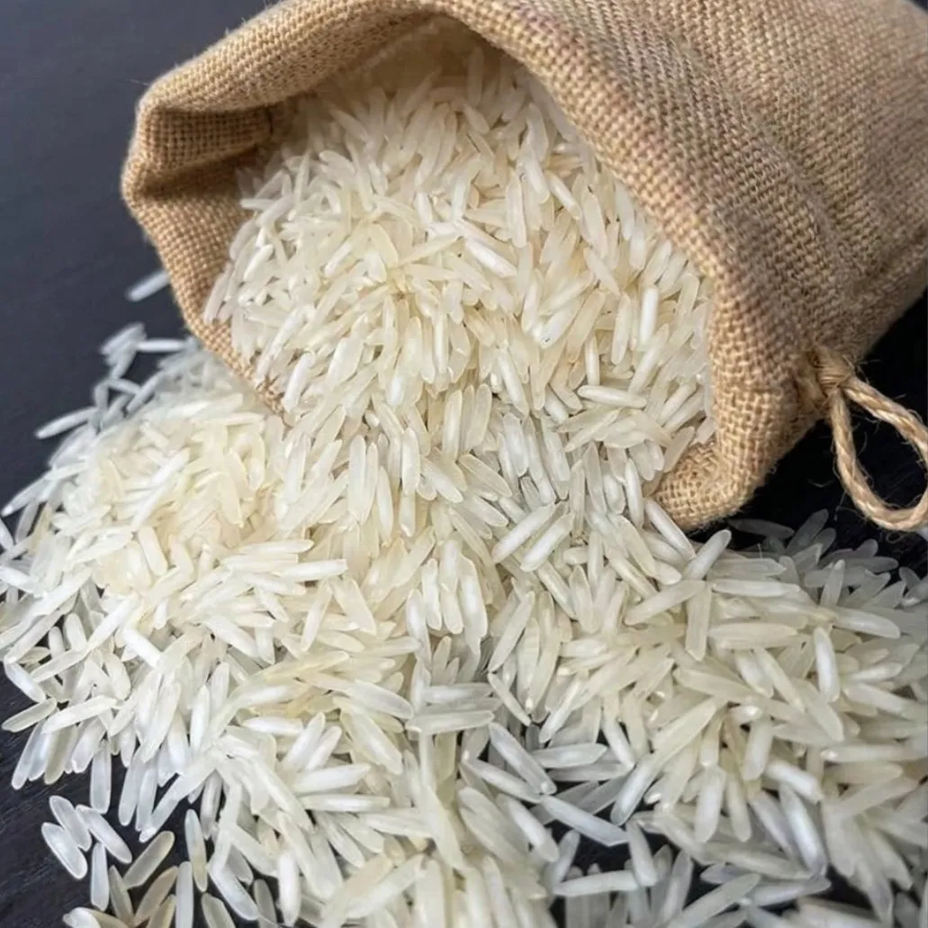 Parboiled long grain Rice spilling from a jute sack