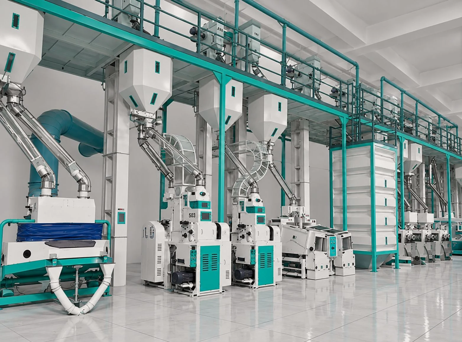 Rice milling machines in a row inside the Unit 2 milling hall, Green Rice Mill Karachi